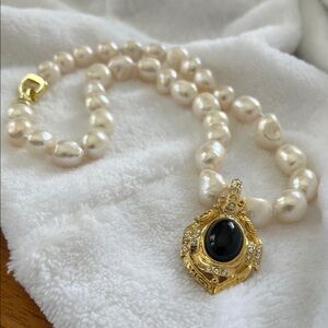Luxurious Pearl Necklace with Gold and Black Pendant